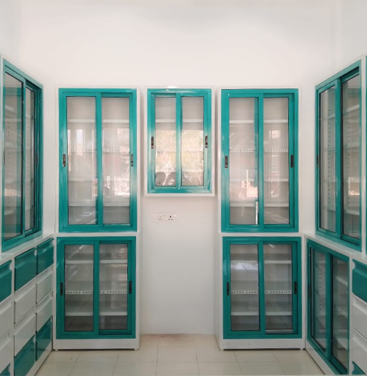 Pharmacy racks with display shelves in a retail store